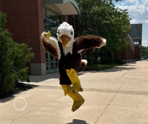 Grand Rapids Christian Schools' Mascot Skipping Outside